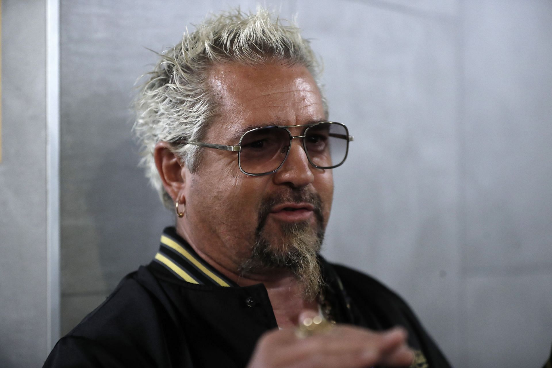 Guy Fieri at his restaurant opening (Image via Getty)